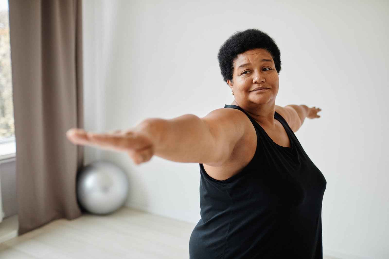 Woman exercising as part of mobility and obesity management